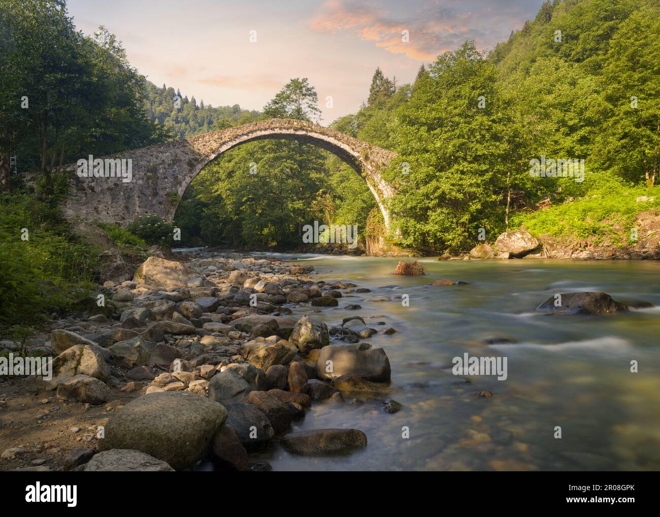Historical Ortan bridge at sunrise. Stone Bridges of Turkey. Black Sea 