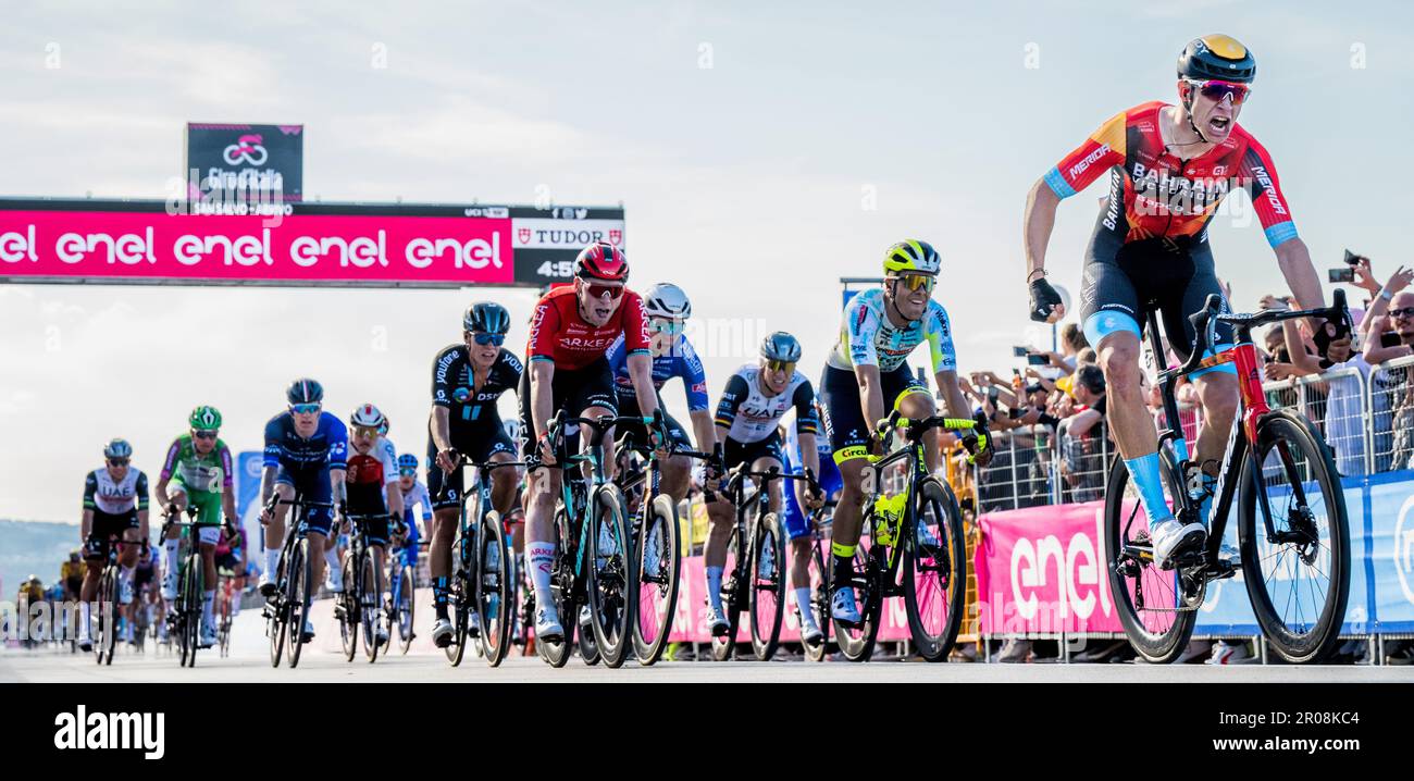 San Salvo, Italy. 07th May, 2023. Italian Jonathan Milan of Bahrain Victorious (R) celebrates as he crosses the finish line to win and Belgian Arne Marit of Intermarche-Circus-Wanty (2R) finishes fourth place at the second stage of the 2023 Giro D'Italia cycling race, 201km from Fossacesia Teramo to San Salvo, in Italy, Sunday 07 May 2023. The 2023 Giro takes place from 06 to 28 May 2023. BELGA PHOTO JASPER JACOBS Credit: Belga News Agency/Alamy Live News Stock Photo