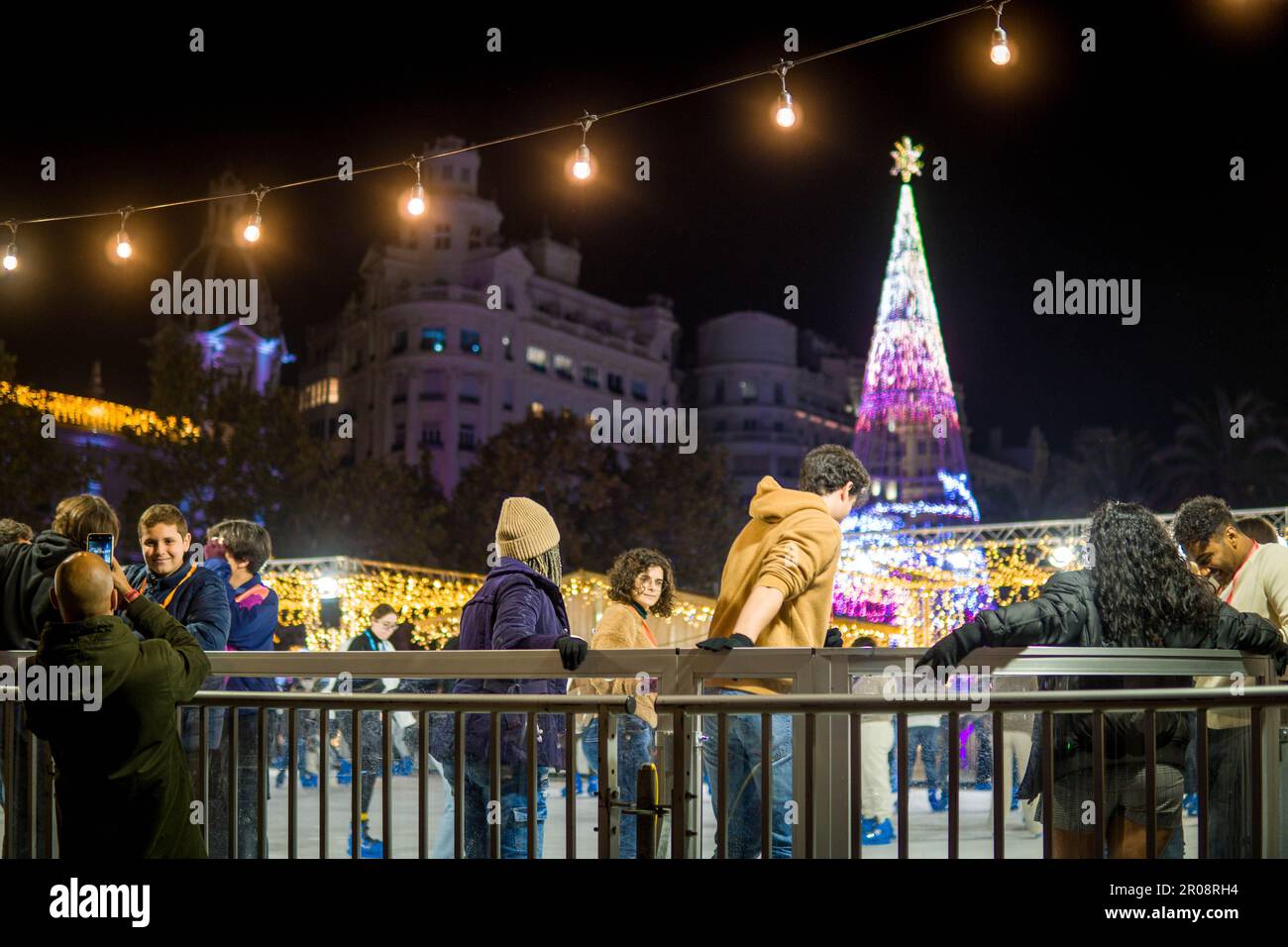 PIcture of Adolescents and Children Skating at Christmas on the Ice
