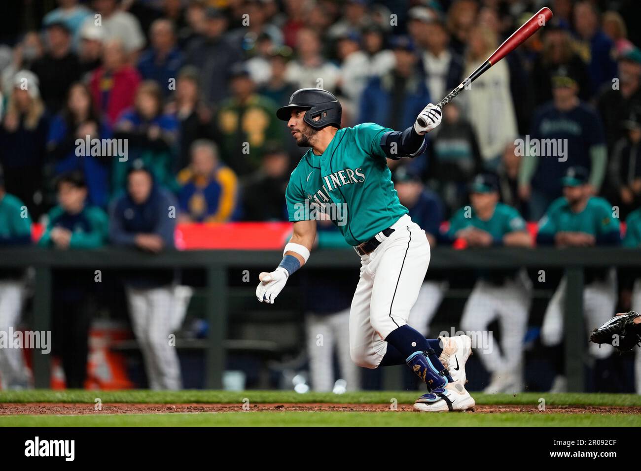 Seattle Mariners' Jose Caballero follows through on a tworun double