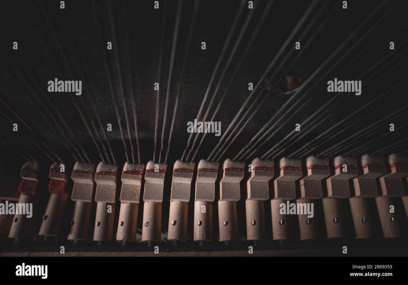 Inside the piano. Strings inside the upright piano Stock Photo Alamy