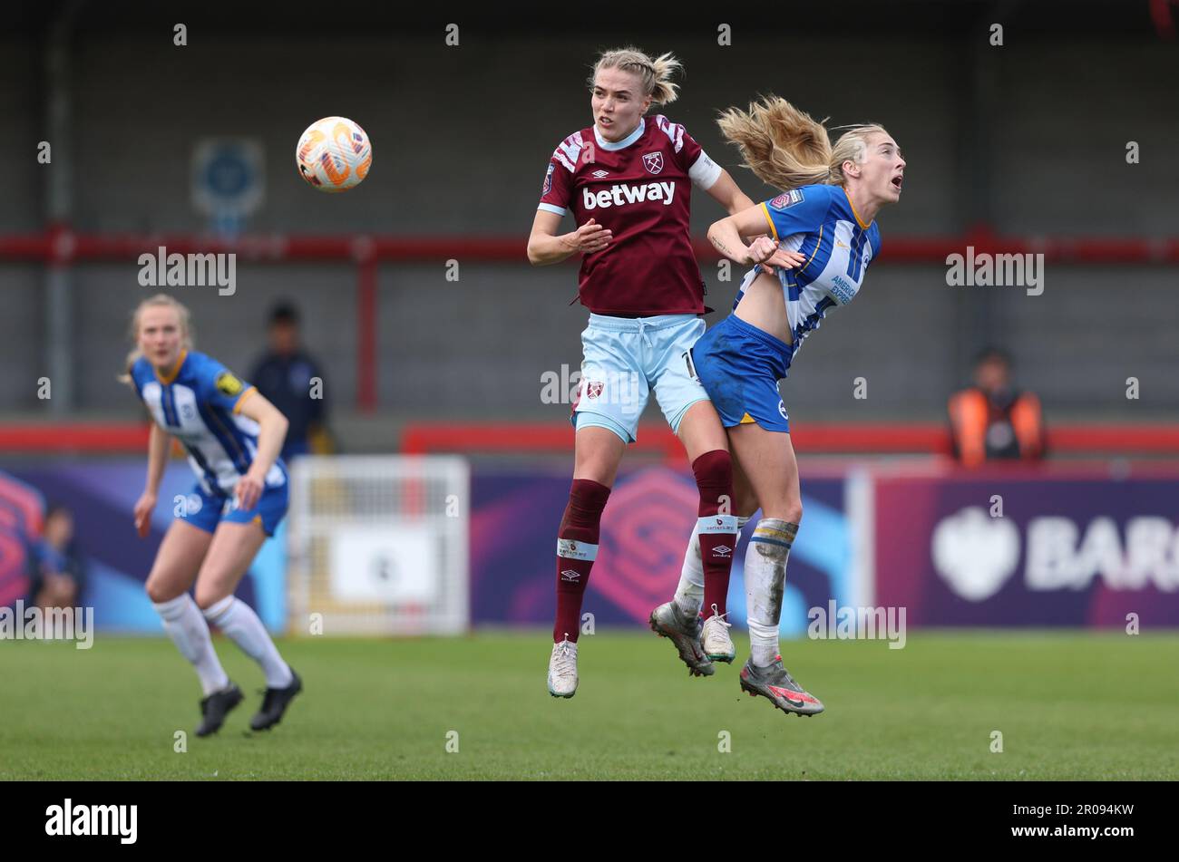 Crawley, UK. 7th May, 2023. West Ham's Dagny Brynjarsdottir challenges Brighton's Megan Connolly during the Barclays Women's Super League match between Brighton & Hove Albion and West Ham United at the Broadfield Stadium in Crawley. Credit: James Boardman/Alamy Live News Stock Photo