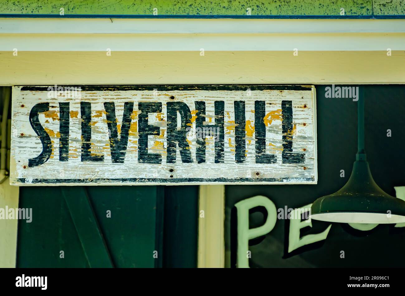 A Silverhill sign hangs in front of Peoples Supply Company, April 30, 2023, in Silverhill, Alabama. The historic general store was built in 1902. Stock Photo