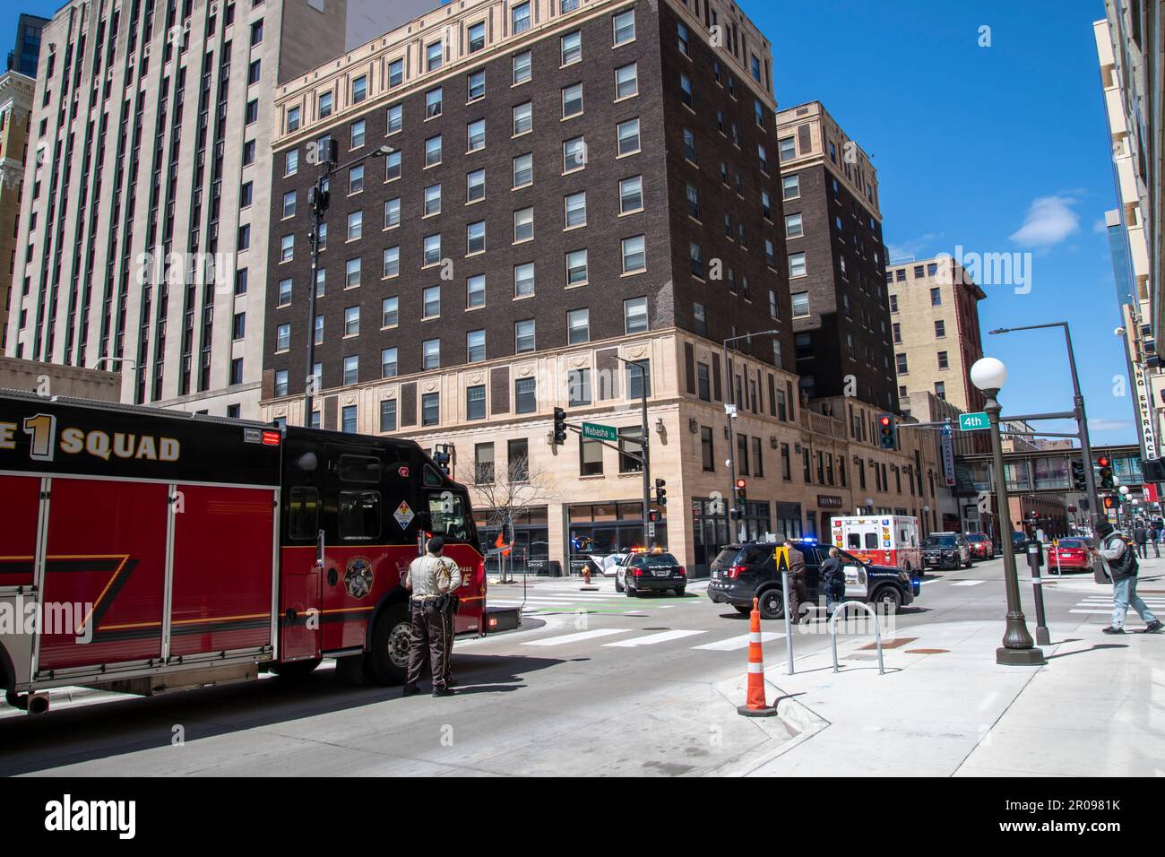 St. Paul, Minnesota.  Police and emergency vehicles wait while negotiations go on with a woman contemplating  jumping out of a hotel window. Stock Photo