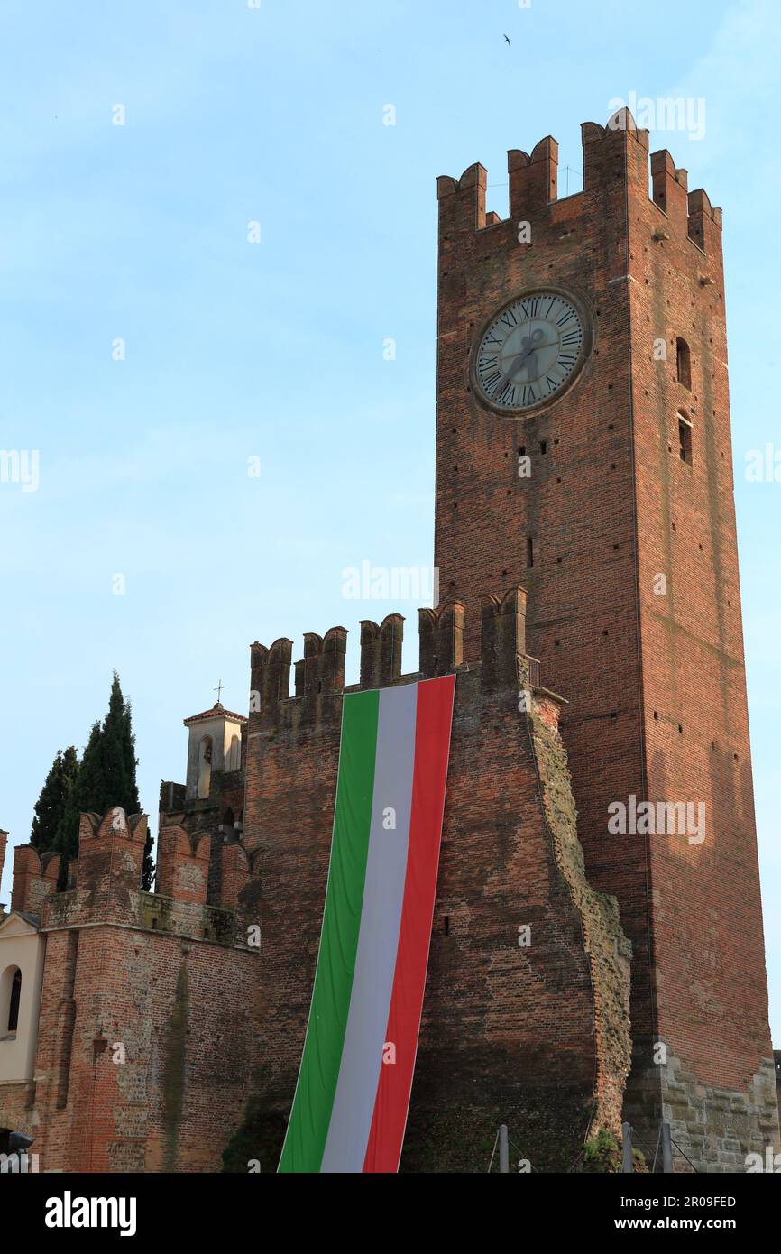Scaliger Castle, Castello Villafranca, Villafranca di Verona, Italy. Italian flag Stock Photo
