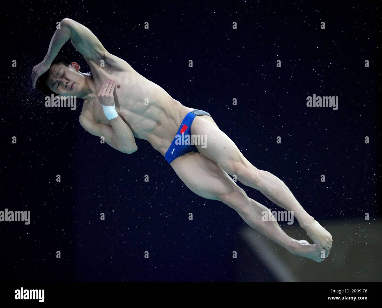 Yang Hao, of China, competes during the men's 10-meter platform final at  the World Aquatics Diving World Cup in Montreal, Sunday, May 7, 2023.  (Christinne MuschiThe Canadian Press via AP Stock Photo -