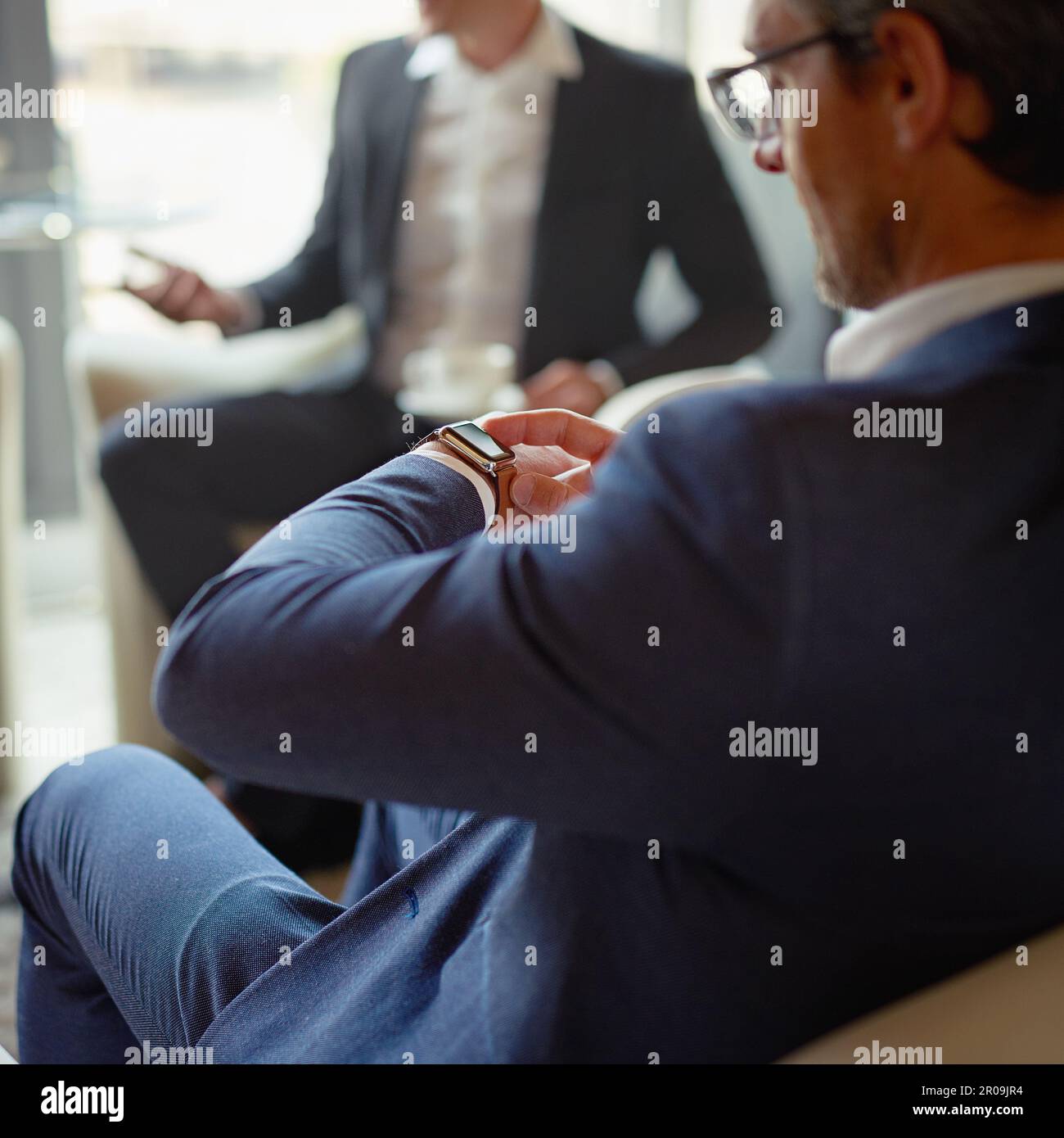 Management checking hi-res stock photography and images - Alamy