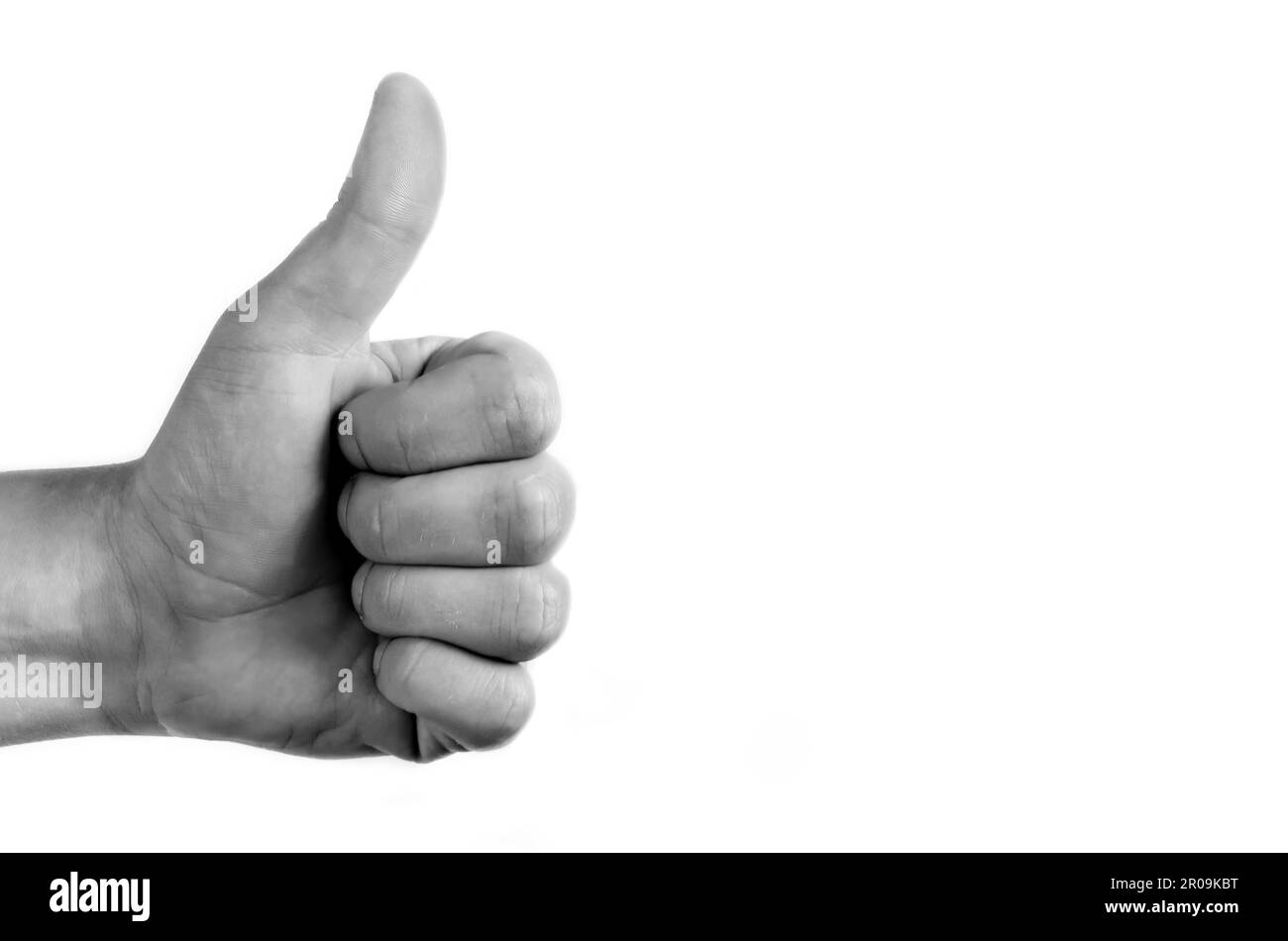 Positive symbol on white isolated background. Hand showing the thumb that is ok. Stock Photo