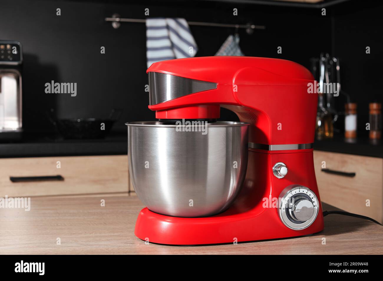 https://c8.alamy.com/comp/2R09W48/modern-stand-mixer-on-wooden-table-in-kitchen-2R09W48.jpg