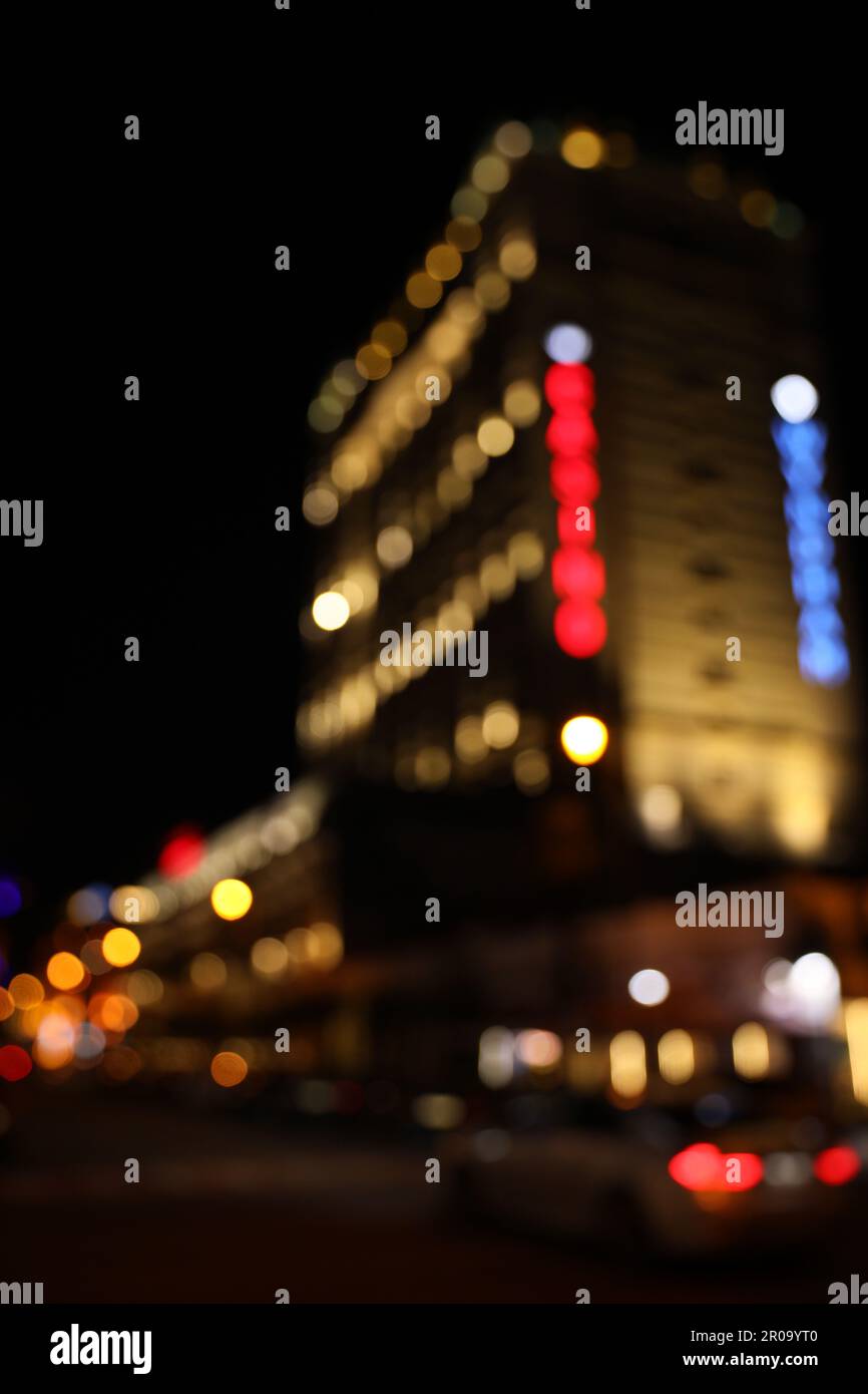 Blurred view of city street with lights at night. Bokeh effect Stock ...