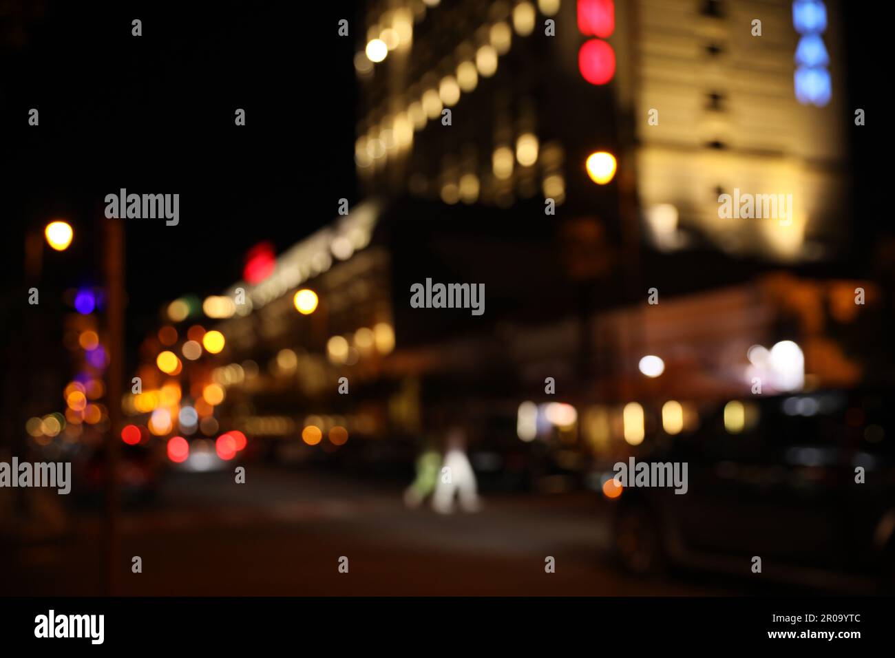 Blurred view of city street with lights at night. Bokeh effect Stock ...