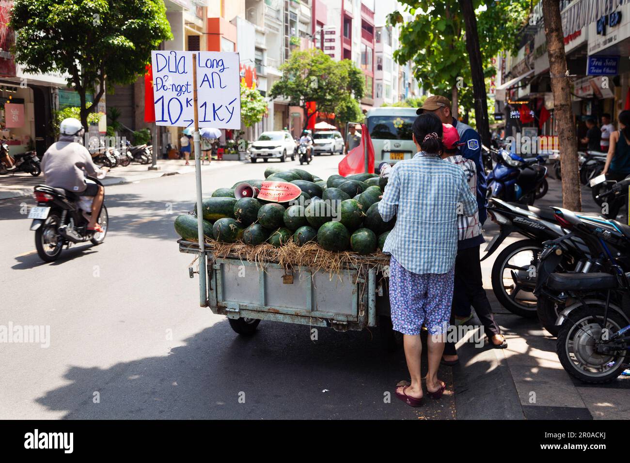 Ho Chi Minh City, Vietnam May 1, 2023 Mobile fruit cart on a side of
