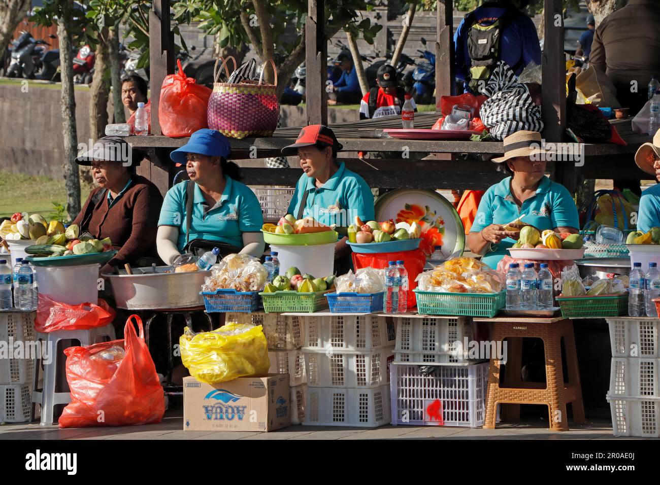 Tabanan, Bali, Indonesia - September 3, 2019: Indonesian woman selling produce in a traditional open market on the streets of the popular tourist area Stock Photo