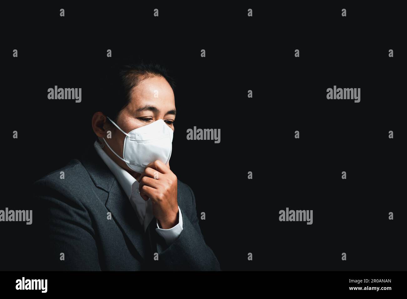 Woman wearing N95 PM 2.5 respiratory protection mask against air