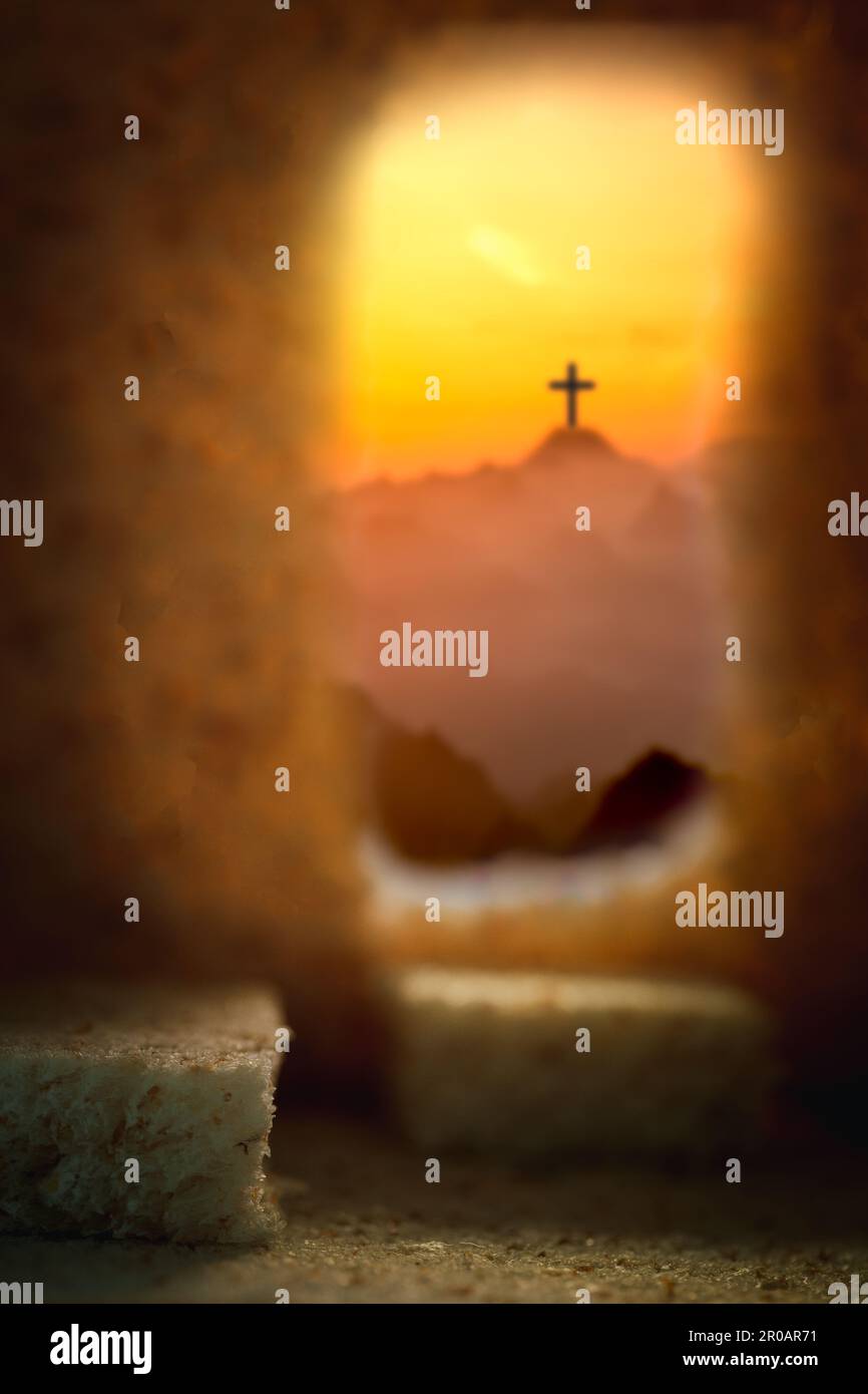 Cross crucified with cave or tunnel It is the tomb where his lifeless body is placed. The concept of the resurrection of Jesus in Christianity. Crucif Stock Photo