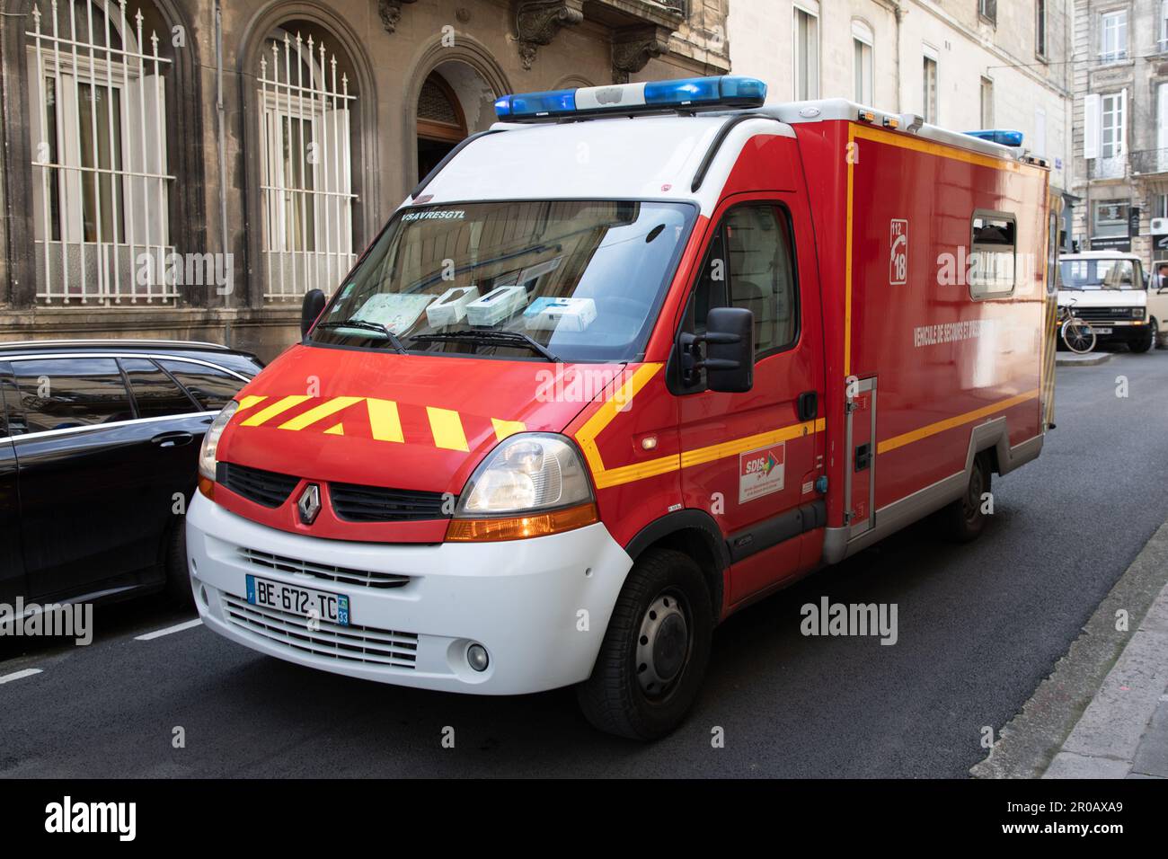 Bordeaux , Aquitaine France 02 27 2023 ambulance van side red panel