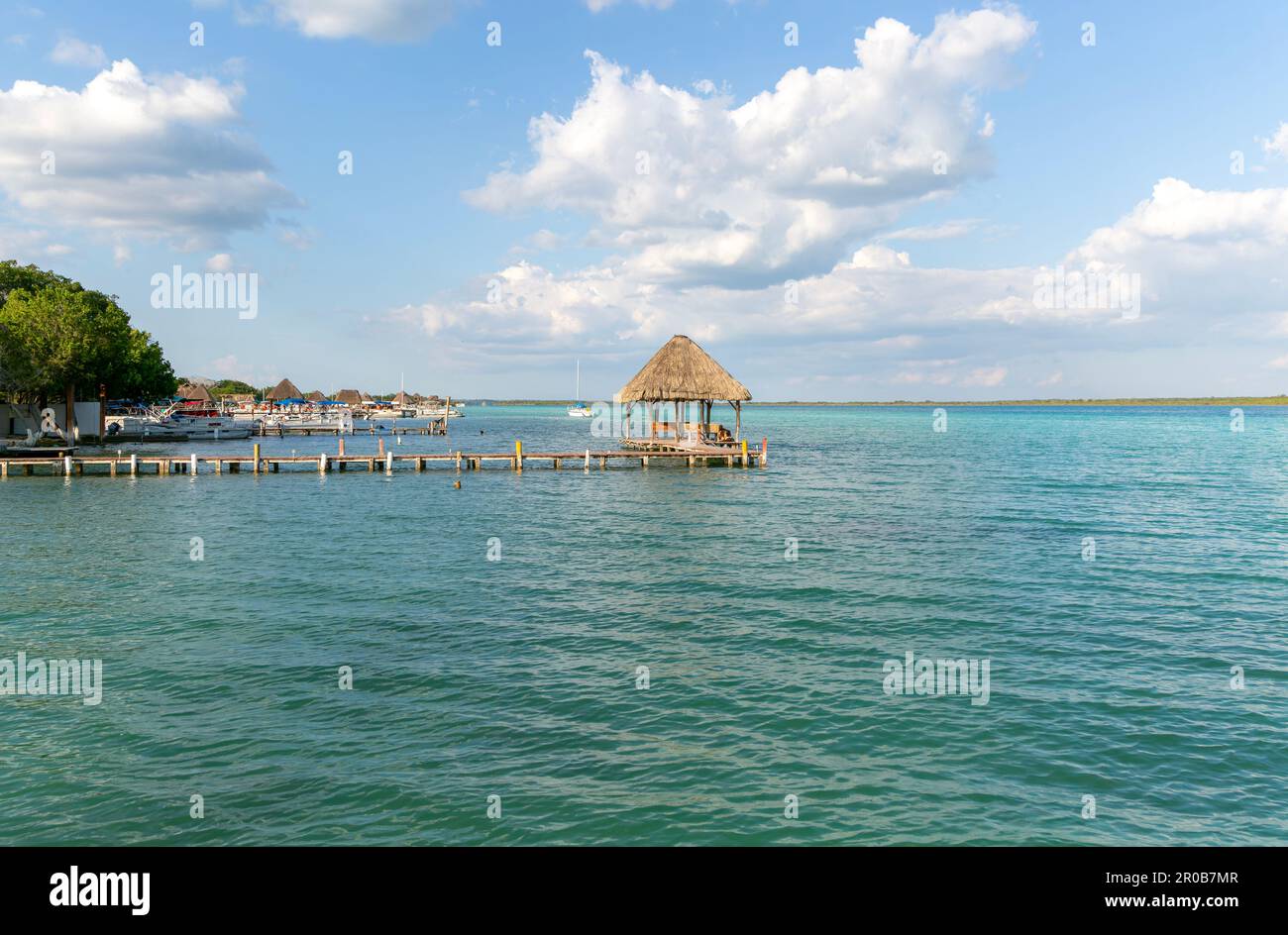 Cabana thatched cabin on wooden jetty Lake Bacalar, Bacalar, Quintana Roo, Yucatan Peninsula