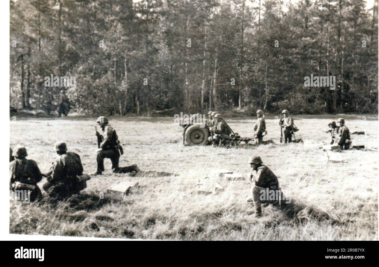 World War Two B&W photo German Soldiers deploy Light Infantry Guns in ...