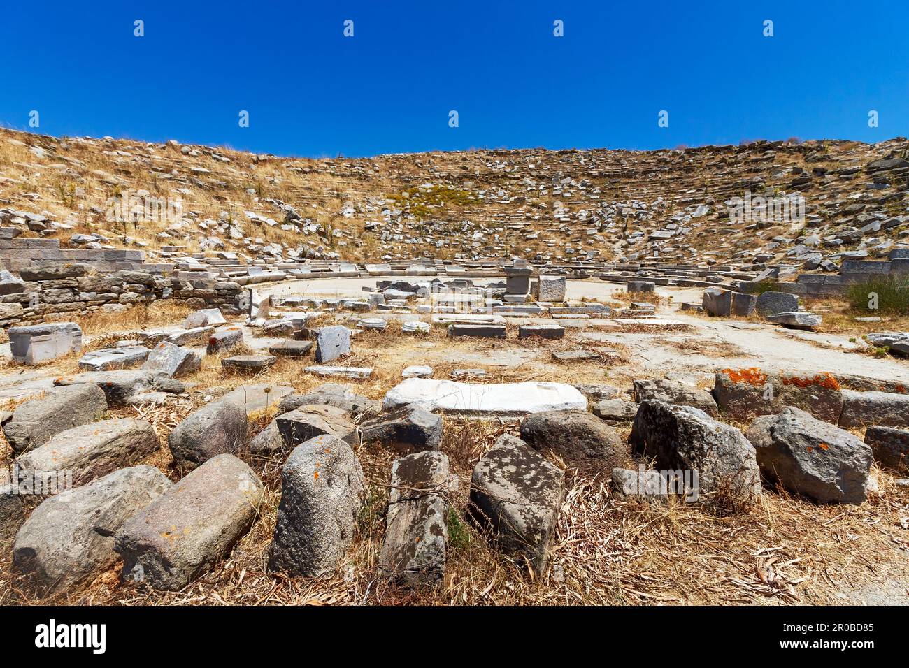 The ancient theater in the archaeological site of the 'sacred' island of Delos. Cyclades, Greece Stock Photo