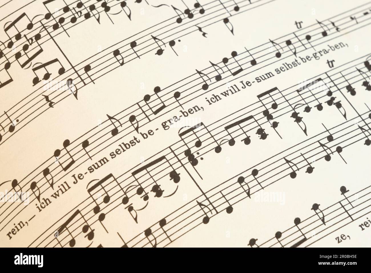 Closeup of the St Matthew Passion by Johann Sebastian Bach. Fragment of a tenor partition with text ich will Jesum selbst begraben Stock Photo