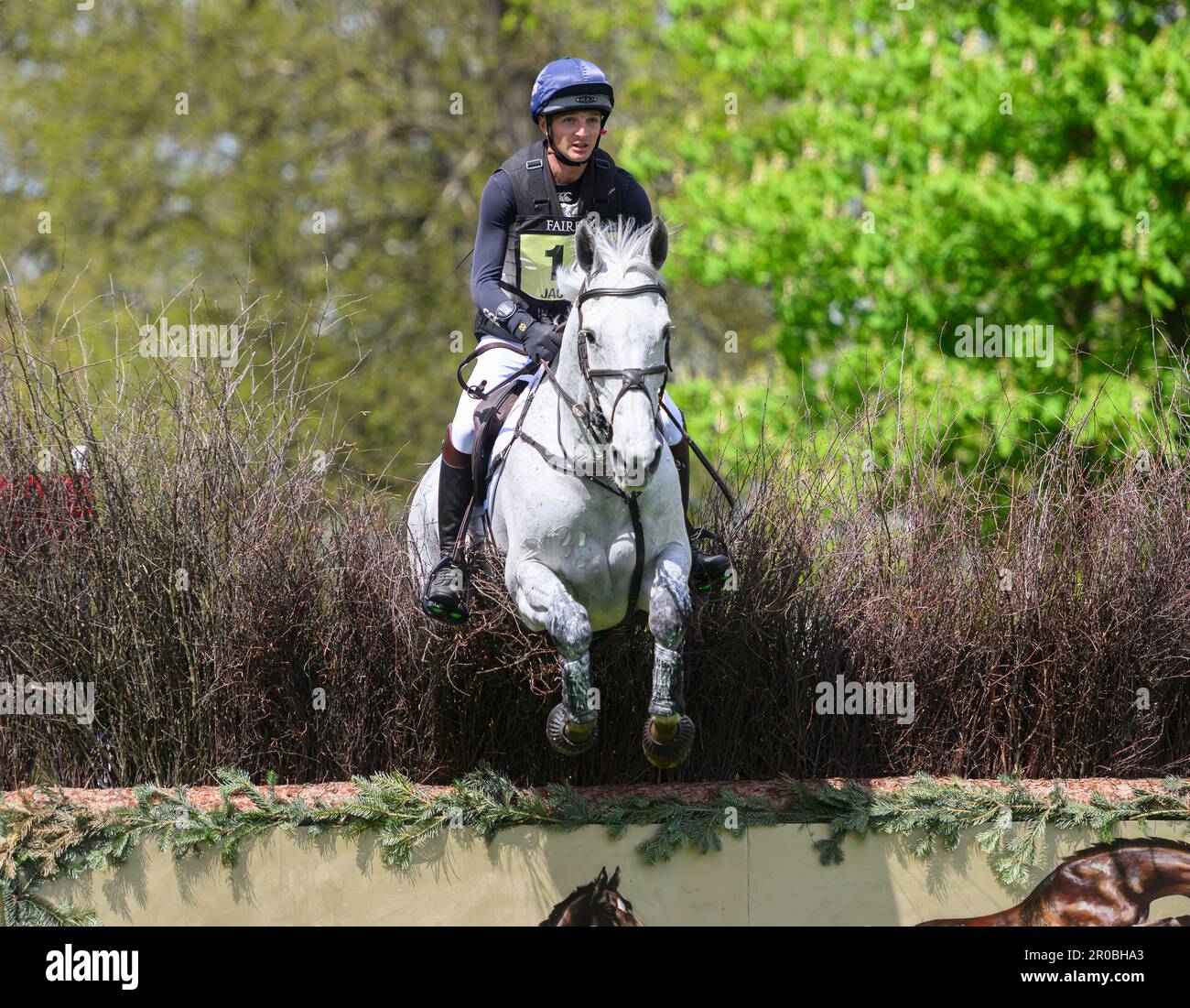 Badminton, UK. 07th May, 2023. 07 May 2023 - Badminton Horse Trials - Cross-Country Test - Badminton - Gloucestershire Tom Jackson rides Capels Hollow Drift during the Cross-Country Test at the Badminton Horse Trials. Picture Credit: Mark Pain/Alamy Live News Stock Photo