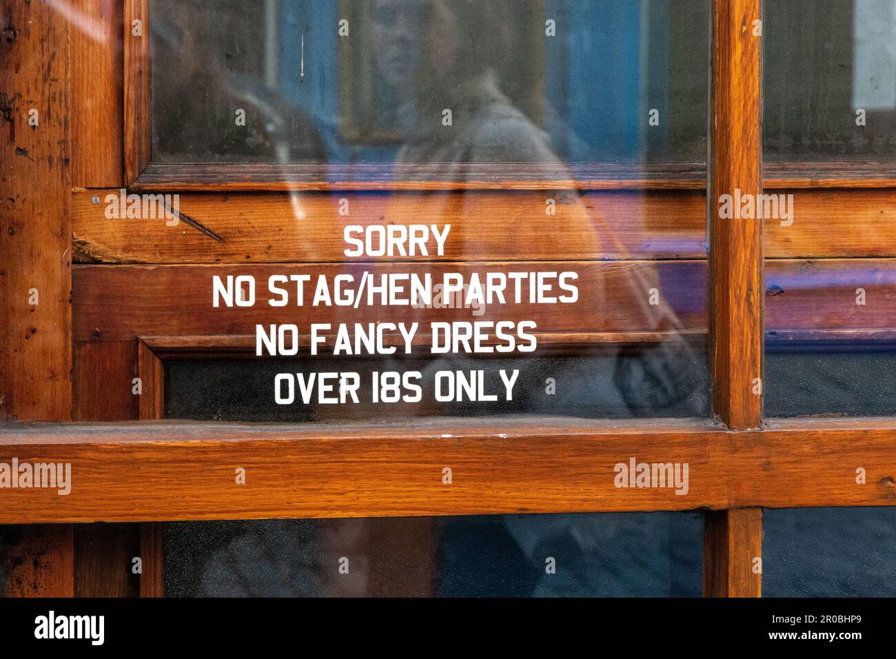 A bar on Victoria St, Old Town, Edinburgh lists the clientele who are