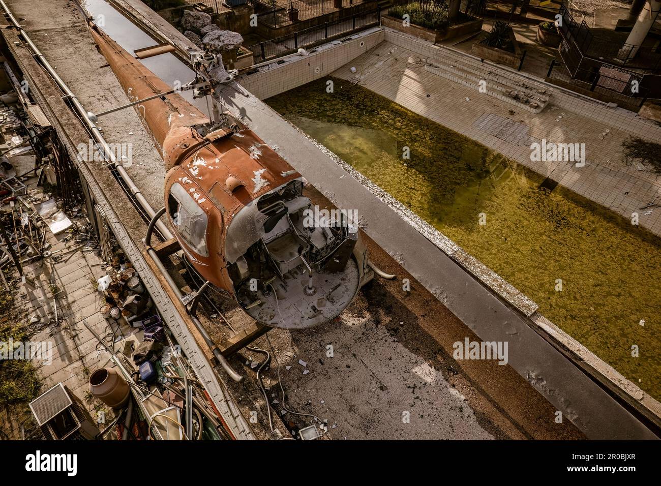 A striking image of an old helicopter left to decay and vandalized ...