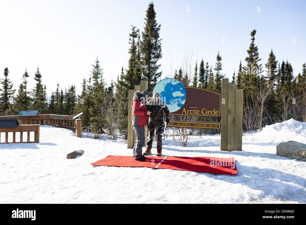 Two people looking at a camera Stock Photo
