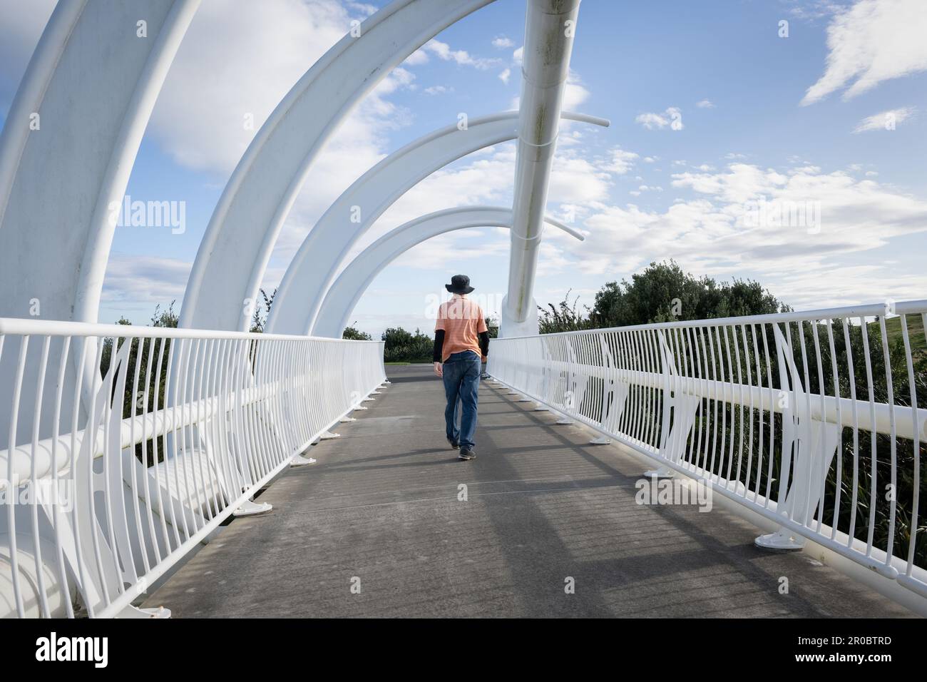 People walking on Te Rewa Rewa bridge. New Plymouth. Stock Photo