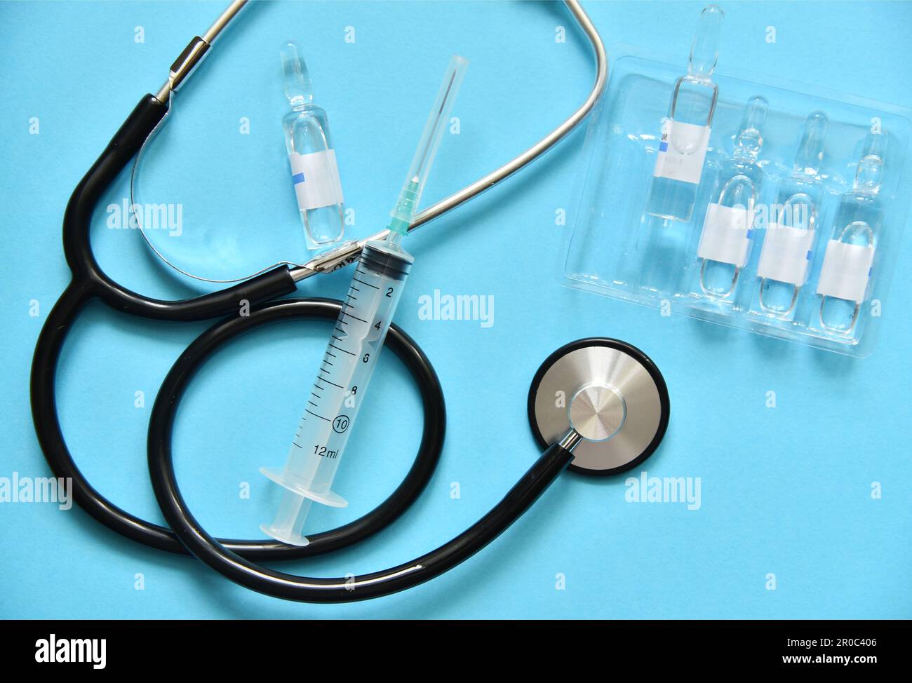 Treatment of the patient. Medical items collection syringe and glass