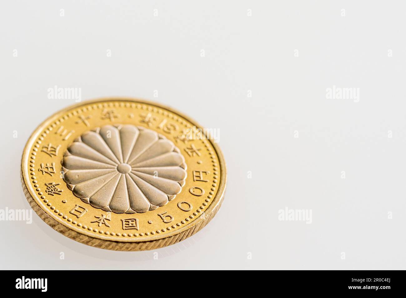 Japanese commemorative 500 yen coin issued in 2019, Heisei 31, to celebrate the 30th anniversary of the enthronement of the Emperor. Stock Photo