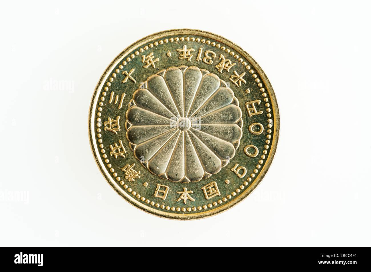 Japanese commemorative 500 yen coin issued in 2019, Heisei 31, to celebrate the 30th anniversary of the enthronement of the Emperor. Stock Photo