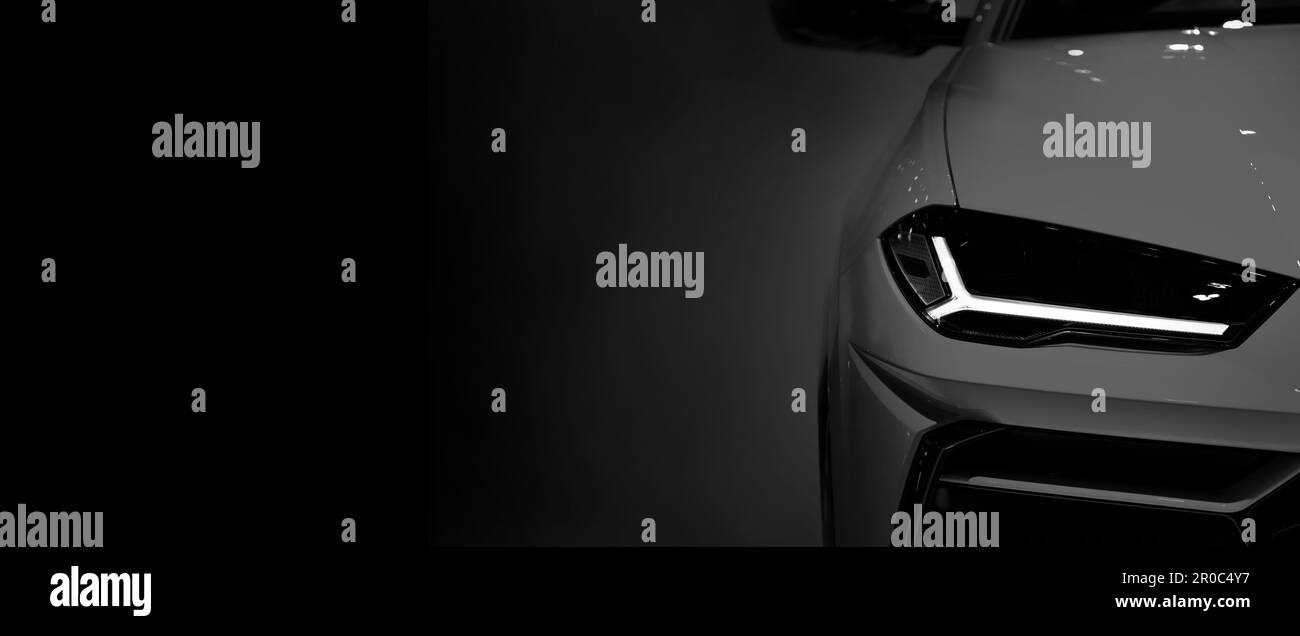 Detail front headlights of sport car black and white background,copy space Stock Photo