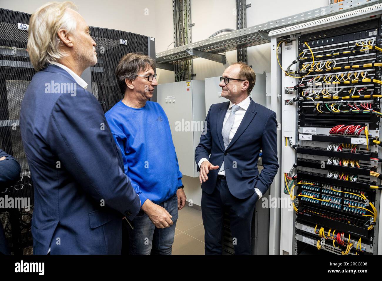 FOCUS COVERAGE REQUESTED TO BELGA - Telenet CEO John Porter and Flemish Minister of Education and Animal Welfare and Sports Ben Weyts receive some information looking at a rack for network cables and switches, during a Press moment to launch a new stage in the Digisprong for schools, at the Technisch Instituut Don Bosco secondary school, in Halle, Monday 08 May 2023. It concerns a framework contract worth 40 million euros between Telenet and the Flemish government, to install fiber optic connections in Flemish schools. Credit: Belga News Agency/Alamy Live News Stock Photo