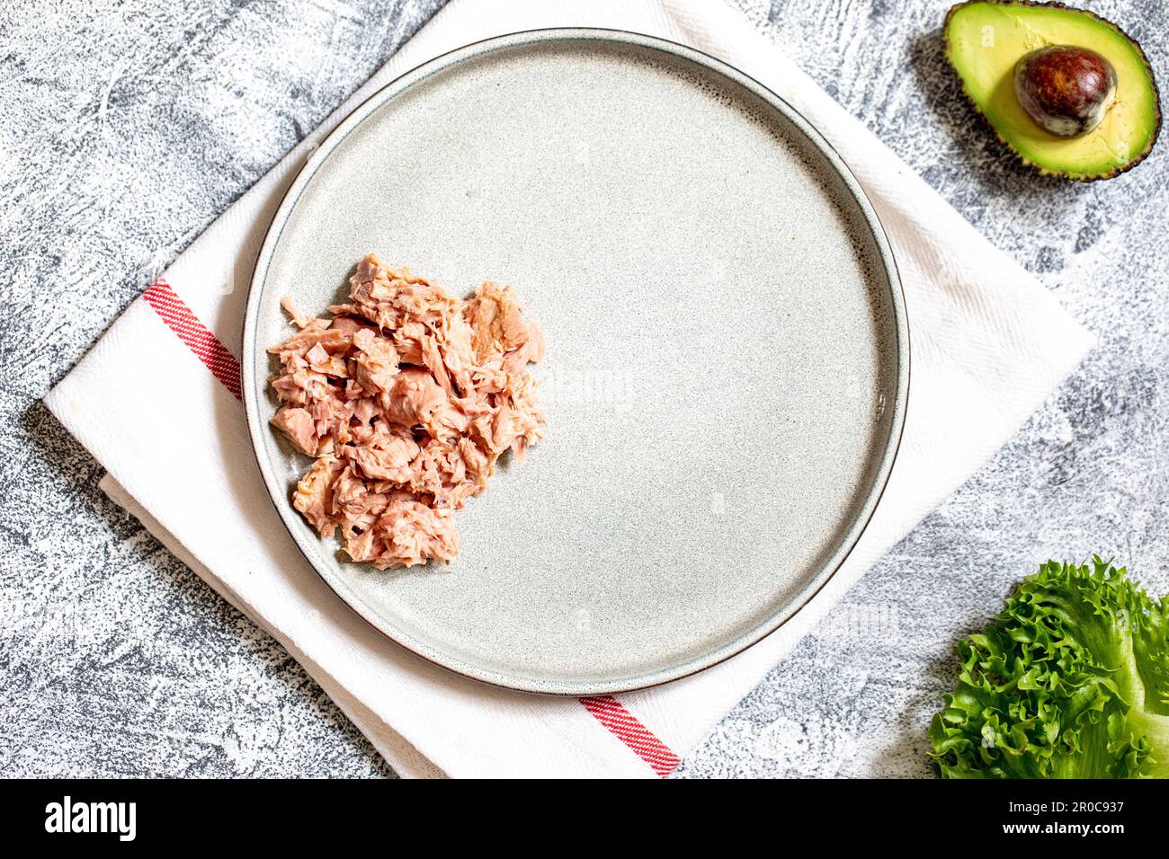 Step 2. Stepbystep preparation of a sandwich with tuna, avocado
