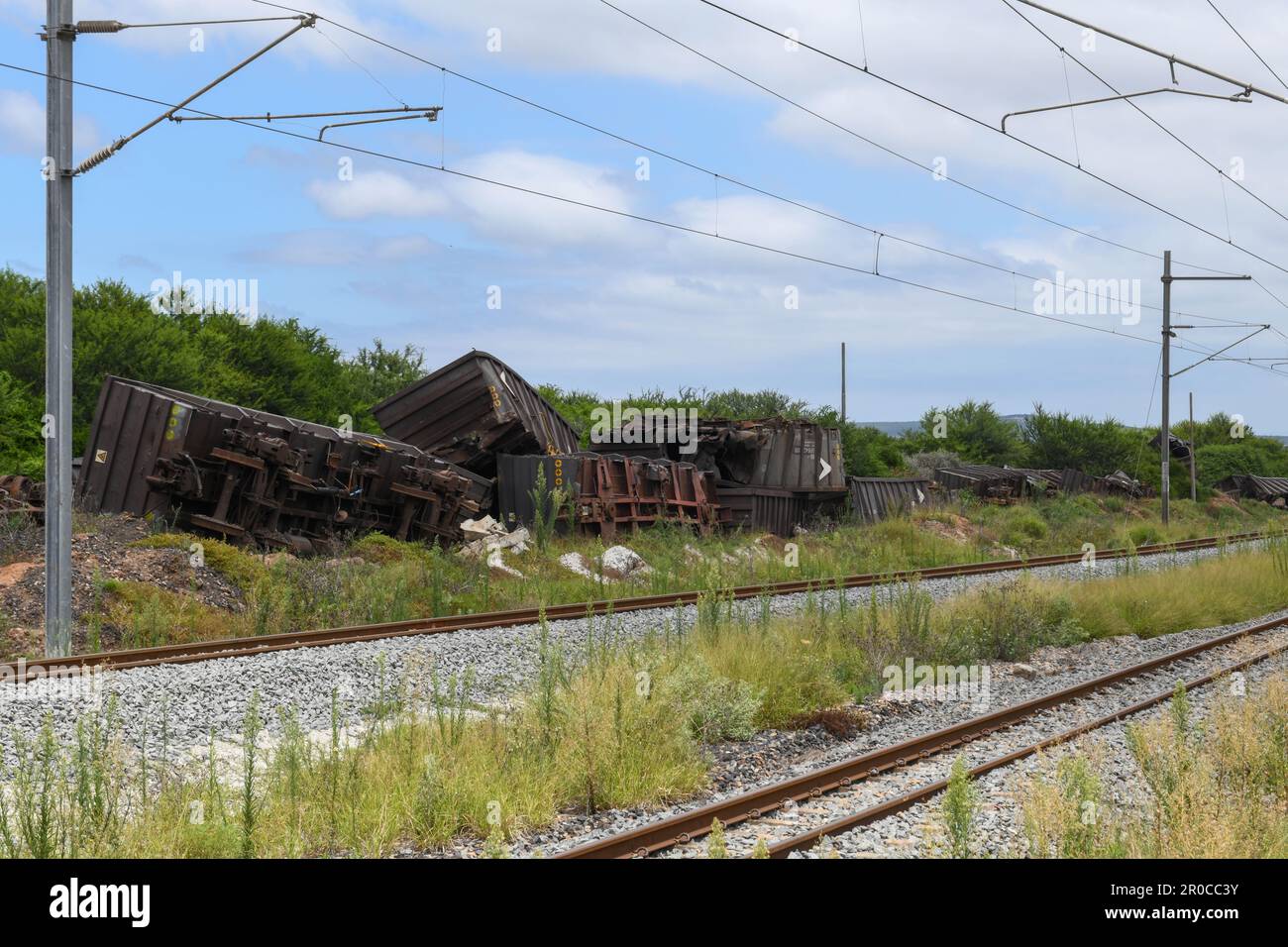 Abandoned train carriages near the tracks at Addo Elephant National ...