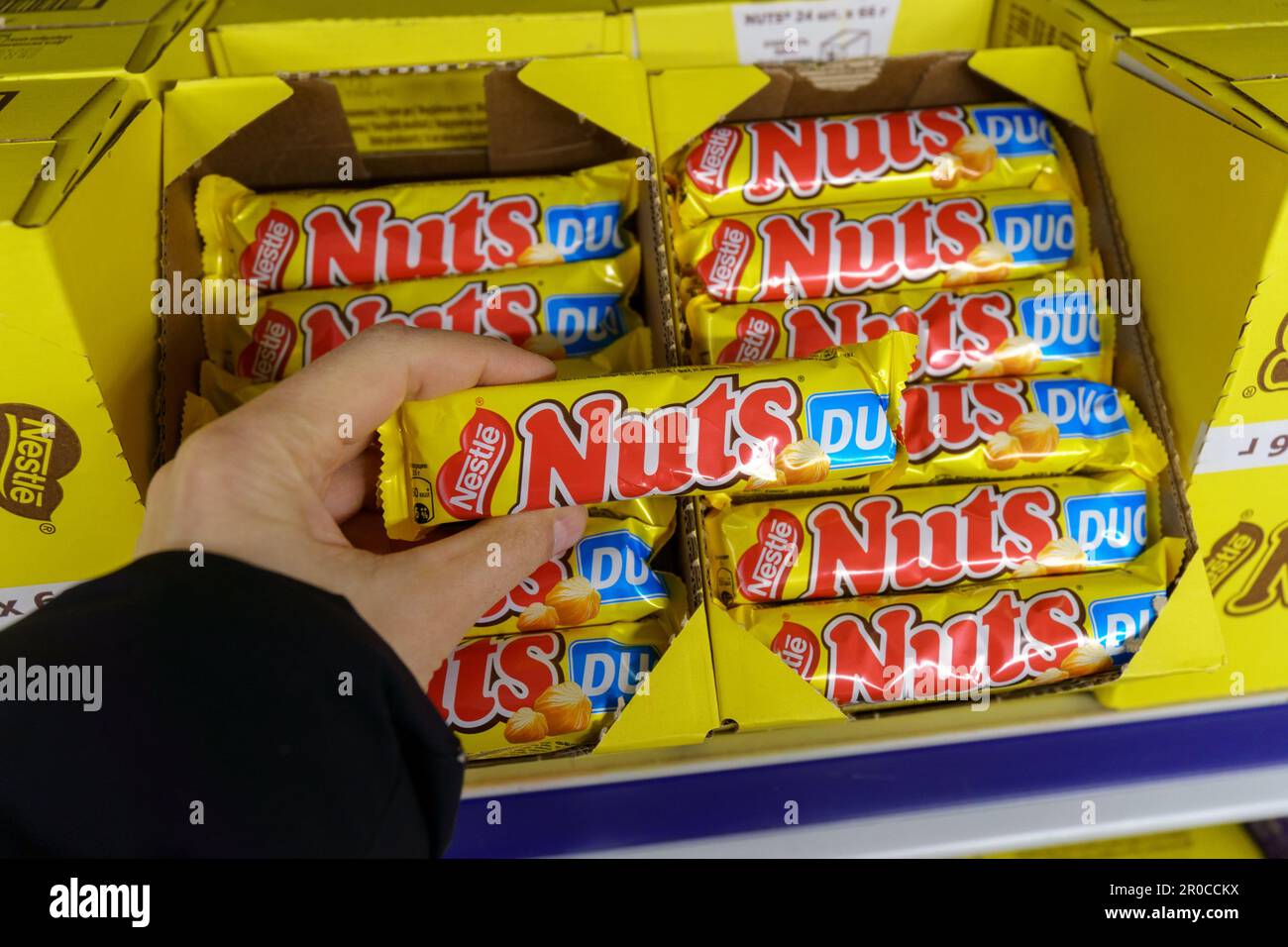Tyumen, RussiaMarch 22, 2023 Nuts chocolate bar from the Nestle company. Grocery store shelves