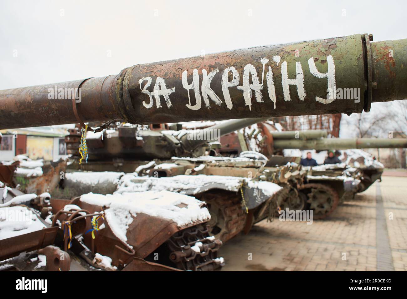 Kyiv, Ukraine - 03.29.2023: Civilian car shot by Russian soldiers. War in Ukraine. Destroyed russian tank on the Mykhailivs'ka Square. Stock Photo