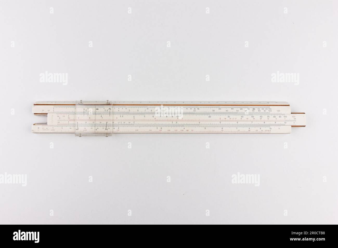 Vintage slide rule calculating and measuring instrument. Mechanical