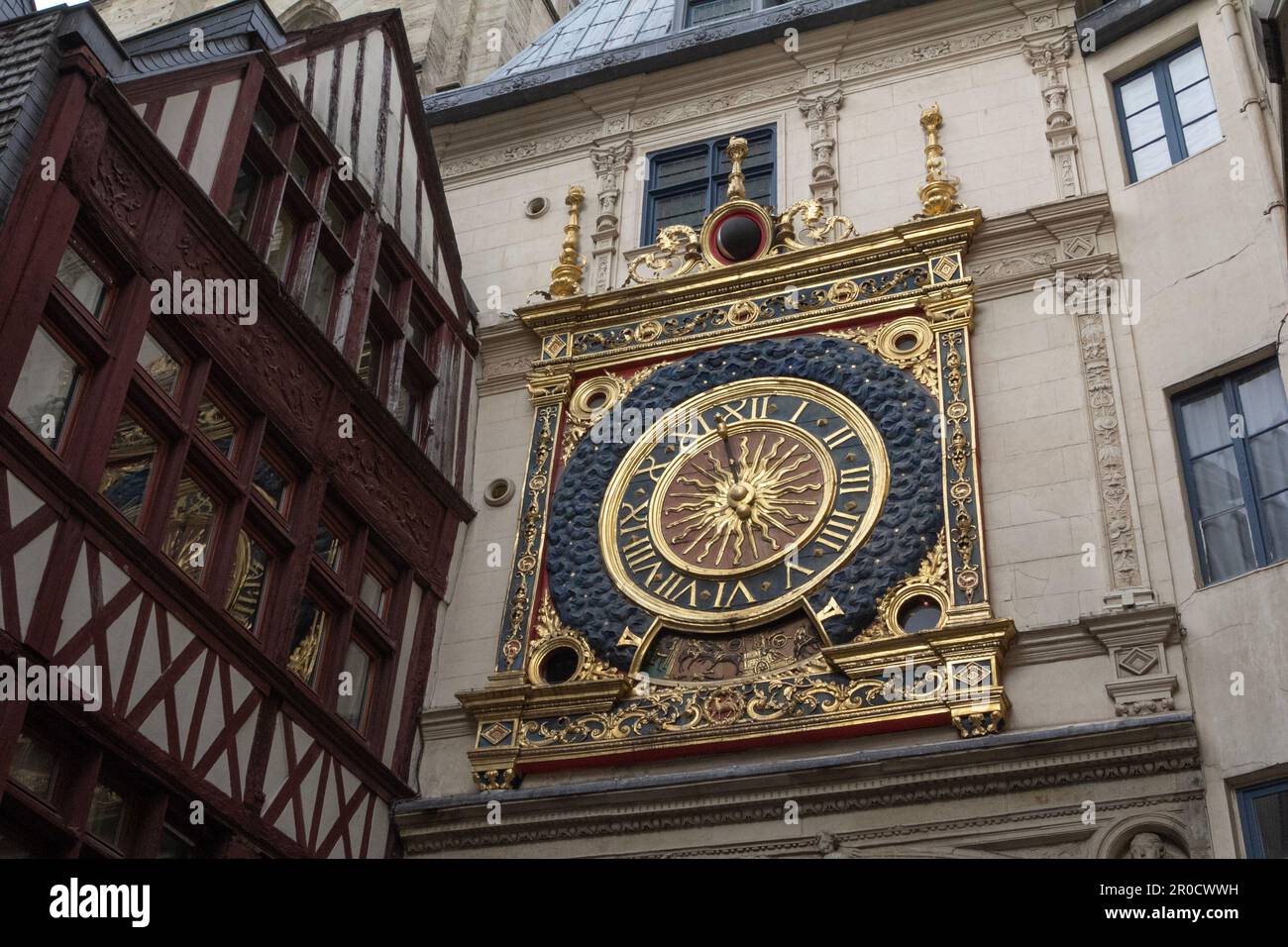 Rouen, France: the Gros Horloge, a 16th century clock in the city's heart has a face on both sides of a building that overarches the eponymous street. Stock Photo