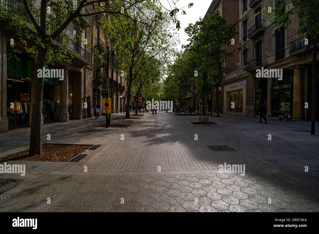 Newly pestestrianised Carrer del Consell de Cent, Barcelona, part of the  eixos verds - Superilla de l'Eixample, April 2023. This is part of an onoing Stock Photo