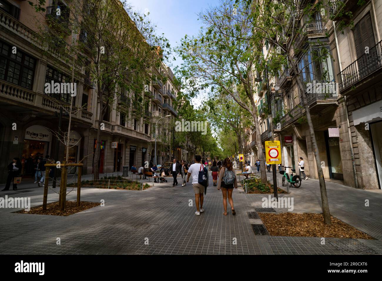 Newly pestestrianised Carrer del Consell de Cent, Barcelona, part of the  eixos verds - Superilla de l'Eixample, April 2023. This is part of an onoing Stock Photo