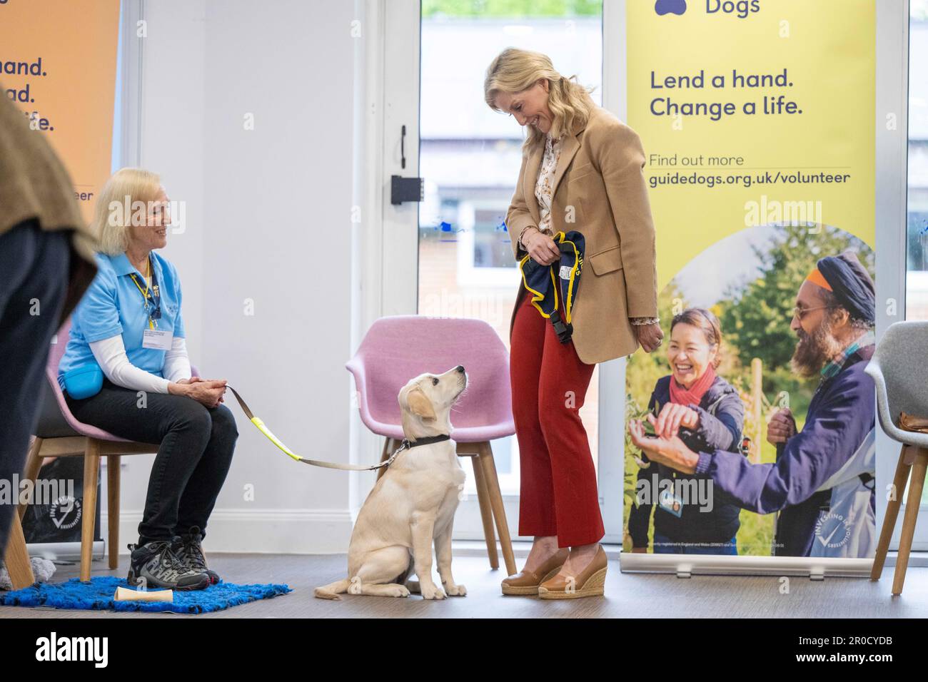 The Duchess of Edinburgh takes part in a puppy class at the Guide Dogs