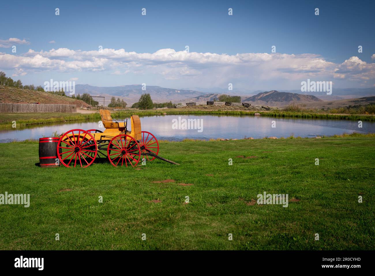 Picturesque Wagon with Red Wheels at Latigo Dude Ranch in Colorado Stock Photo