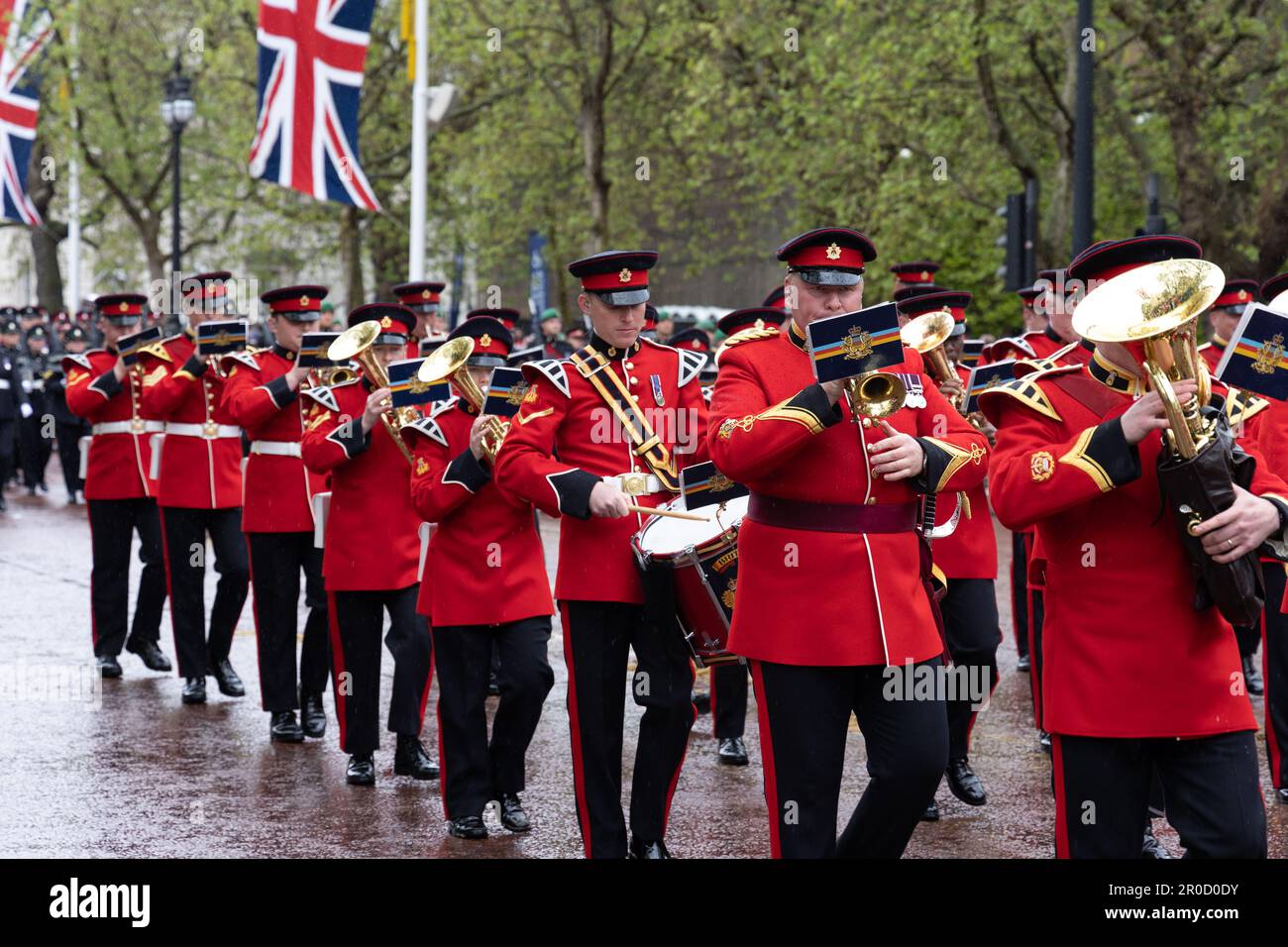 Massed Foot Guards' Band taking part in King Charles Coronation procession along The Mall in London on 6th May 2023 Stock Photo