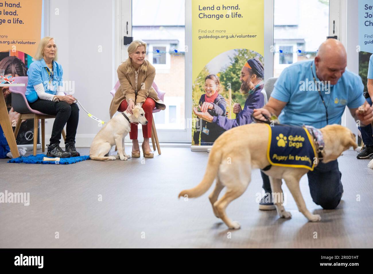 The Duchess of Edinburgh takes part in a puppy class at the Guide Dogs
