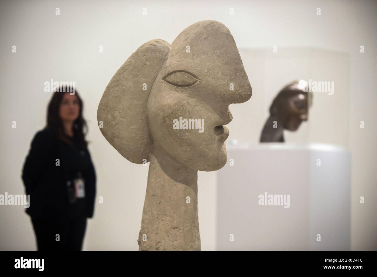 A worker stands near sculptures during the presentation of the new exhibition 'Picasso Sculptor: Matter and Body' at the Picasso Museum in Malaga. As part of activities to commemorate the 50th anniversary of Picasso's death, the museum has organized different events and exhibitions throughout the year 2023, known as 'Picasso year.' The new exhibition showcases Picasso's facet as a sculptor, featuring sculptures that represent the human body using uncommon materials and techniques. This exhibition will run From May 9 to 10 Sept. (Photo by Jesus Merida/SOPA Images/Sipa USA) Stock Photo