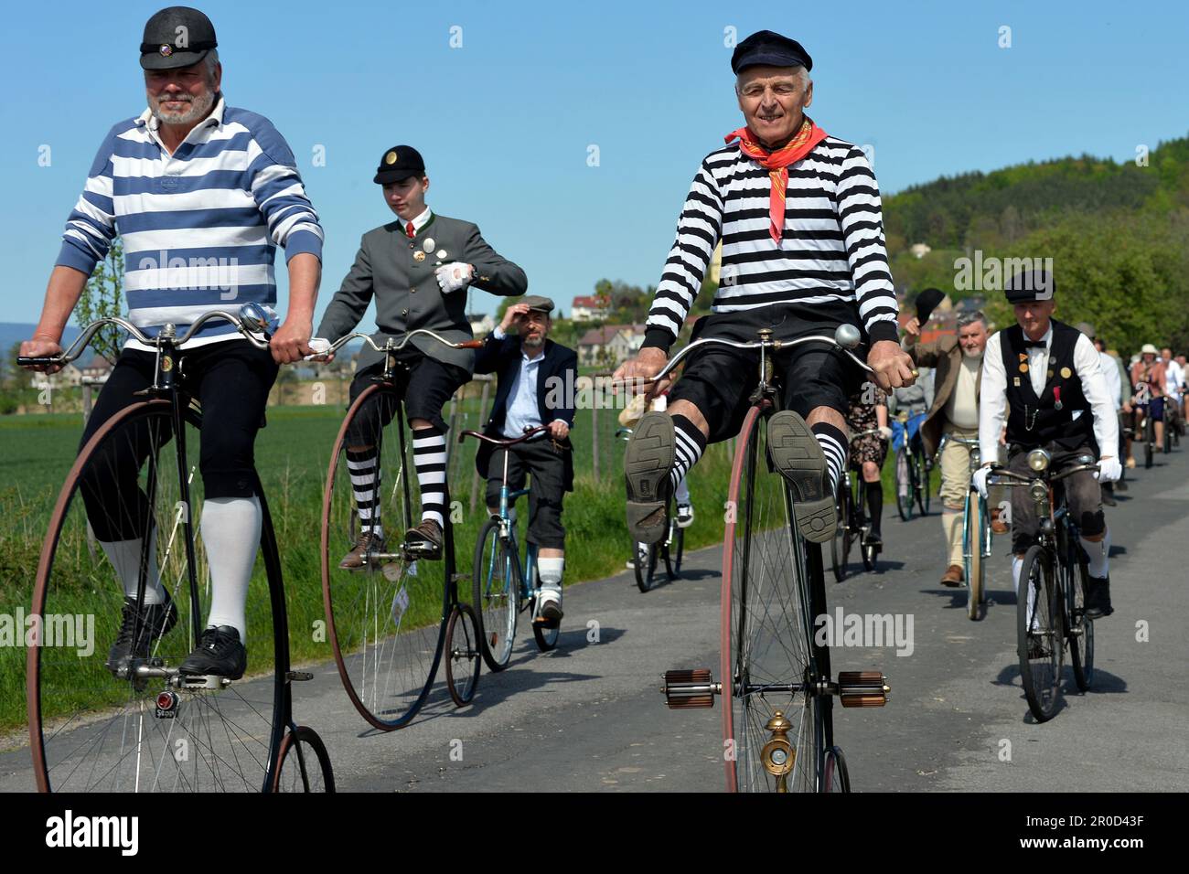 Vsen, Czech Republic. 8th May, 2023. Historic High Wheel Penny-farthing bicycle ride in Vsen in the Bohemian Paradise during Victory Day, on May 8, in the Czech Republic.Vintage with a bright twist, hoping to win the best-dressed bike competition in the annual Historic High Wheel Penny-farthing bicycle ride.The penny-farthing, also known as a high wheel and ordinary, is a type of bicycle with a large front wheel and a much smaller rear wheel. It was the first machine to be called a 'bicycle' (Credit Image: © Slavek Ruta/ZUMA Press Wire) EDITORIAL USAGE ONLY! Not for Commercial USAGE! Stock Photo