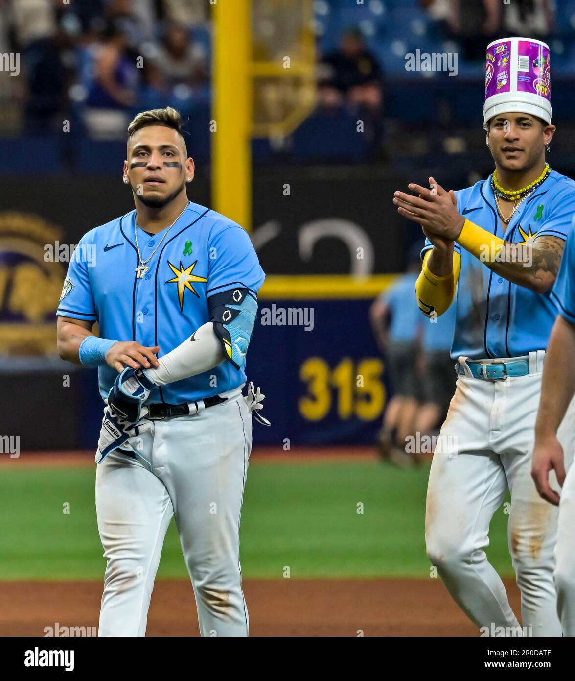 Tampa Bay Rays' Isaac Paredes, left, and Jose Siri celebrate a 8-7 win  during a