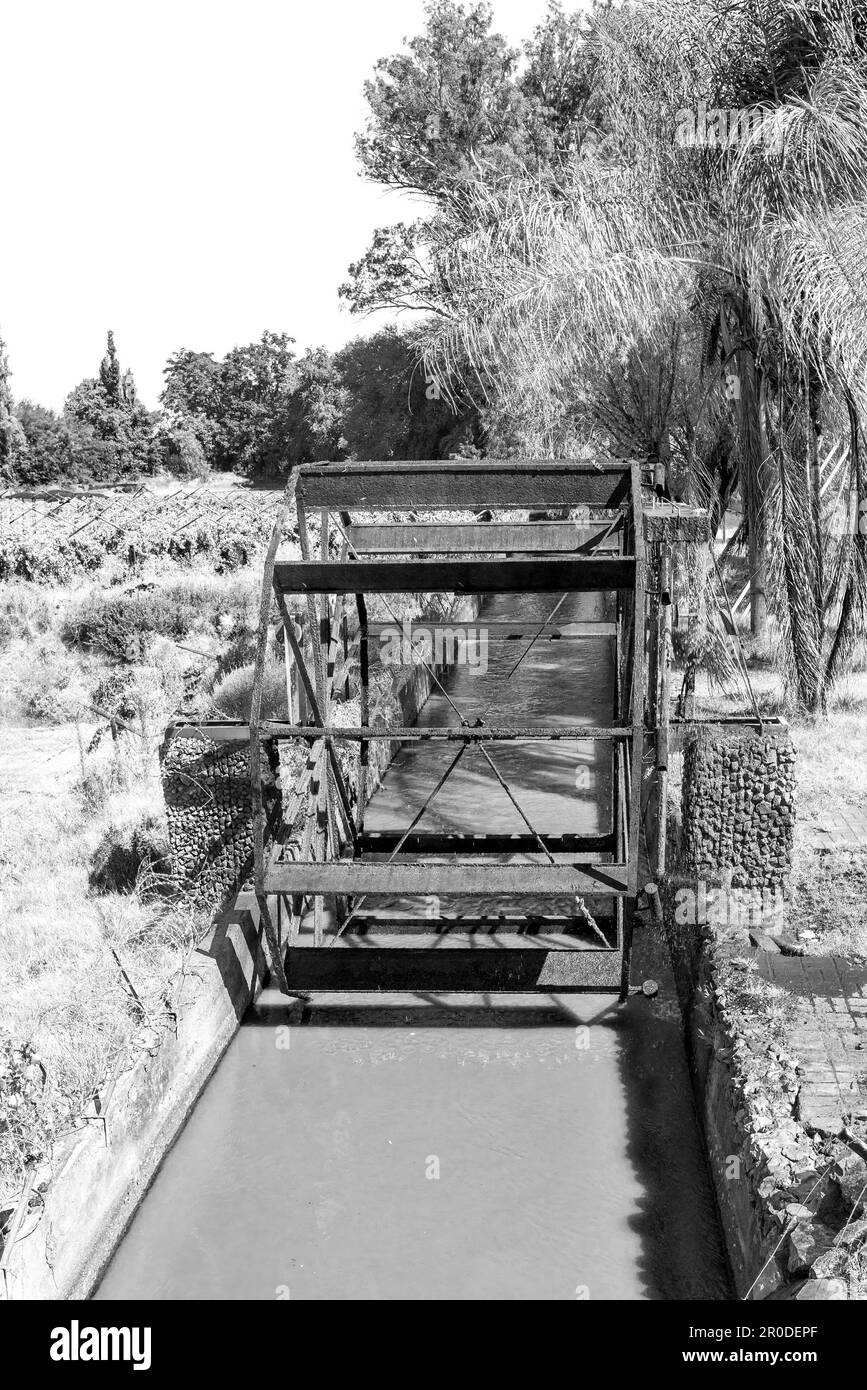 An irrigation canal and working waterwheel replica in Keimoes in the